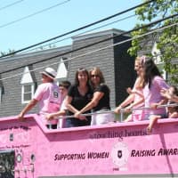 <p>GOR co-founder Marianne Ecanosti, right, and President Daria Lojik ride the pink truck in Wayne&#x27;s Memorial Day Parade.</p>