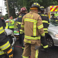 <p>Trumbull fire crews extricated patients from a three-car crash on White Plains Road Friday morning.</p>