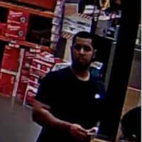<p>Surveillance footage of one of the suspects believed to have stolen credit cards from Trumbull mailboxes</p>