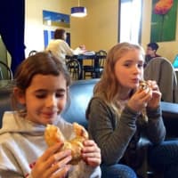 <p>Chowing down on the baked goodies at Tusk &amp; Cup in Ridgefield.</p>