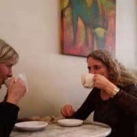 <p>Customers enjoy coffee at Tusk &amp; Cup in Ridgefield.</p>
