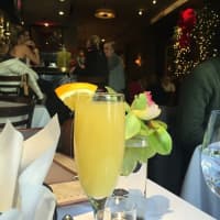 <p>The mimosas at Underhills Crossing in Bronxville are garnished with orange slices.</p>