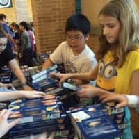 <p>Scarsdale Middle School students helped collect and bag goods for nearly 150 families in need.</p>