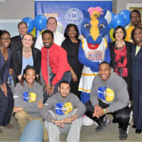<p>Mr. Goodman and Ms. Russell-Humes are joined by representatives of the many college groups that collaborate to make the Monroe Miles event a success, including students and members of the alumni relations, athletics, and student services teams.  </p>