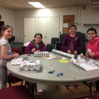 <p>Together members of the Village Lutheran Church Youth Group wrapped the toys, games, books and other gifts, which will help brighten another child&#x27;s Christmas morning.</p>