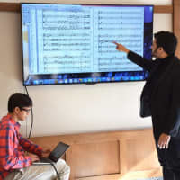 <p>Bronxville High School orchestra students, who had been composing their own music, worked with a group of professional musicians who helped them revise and refine their pieces.</p>