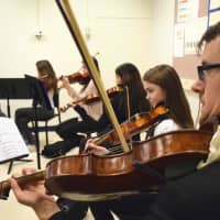 <p>The orchestra students worked in small groups with the quartet members to refine each composition and as a result of the creative and collaborative process, they learned a variety of strategies for composing music.</p>