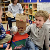 <p>As part of the lesson, the students created their own puppets out of paper bags and gave each of their characters a name and defining traits.</p>