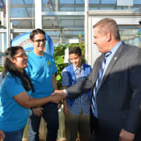 <p>Yonkers Mayor Mike Spano was joined by volunteers with the Science Barge and members of the Green Mountain Energy.</p>