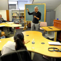 <p>Award-winning Spanish author José Ovejero teaches a creative writing masterclass to students at the College of New Rochelle.</p>
