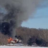 <p>Firefighters are battling a three-alarm fire in Clinton Corners.</p>