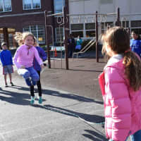 <p>Bronxville Elementary School fifth-graders work paired with younger students for the program.</p>
