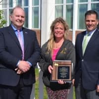 <p>Dutchess County Executive Marc Molinaro, second from right, presented Heather McCaffrey, center, of the Arlington Central School District with her award.</p>