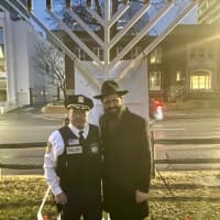 <p>Police Commissioner David Chong and Rabbi Avrohom.</p>