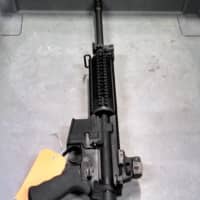 <p>A Congers man was arrested for pointing a loaded assault rifle at another man during a dispute.</p>