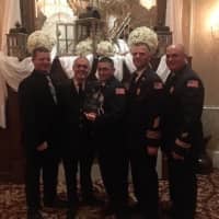 <p>The presentation of Chief&#x27;s Award, from left, outgoing Asst. Chief Brian Neary, 1st Asst. Chief Brian Sacher, Firefighter Brian Ward, Chief Jeff Boyle and 2nd Asst. Chief Bob Trace.</p>