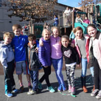 <p>Bronxville Elementary School fifth-graders work with younger students as part of the school’s Lunch Buddy program.</p>