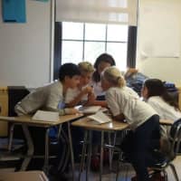 <p>Eastchester&#x27;s Battle of the Books team practicing.</p>