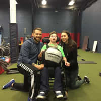 <p>A happy client at Gifted Fitness in Ramsey. Owner Russ Van Ness is on the left.</p>