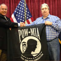 <p>Eastchester Town Supervisor Anthony S. Colavita and Lawrence LaFredo, who donated the flag from Greenburgh.</p>