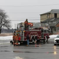 <p>Firefighters douse a heater fire at the Greater Mahopac/Carmel Chamber of Commerce.</p>