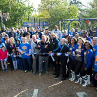 <p>Yonkers Mayor Spano helps cut the ribbon on a new playground and basketball court at The Westchester School in Yonkers on Sunday, Oct. 23. The Knicks, Westchester Knicks and Chase came together to build a new playground.</p>