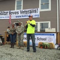 <p>Habitat for Humanity of Westchester CEO Jim Killoran dedicating the Yonkers home to the Arroyo family.</p>