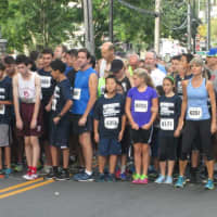<p>Runners at the starting line for the Eastchester 5K last year.</p>