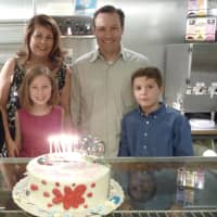 <p>Jacqueline and R. Heath at one of their children&#x27;s latest birthday parties at Topps Bakery in Bronxville. The event naturally featured three cakes.</p>