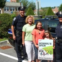 <p>Tuckahoe Police Officers Vincent Pinto and Emily Yankowski helped to launch AAA’s “School’s Open – Drive Carefully” campaign at police headquarters in Tuckahoe, NY with Olivia and Gianna Solano.  Donna Galasso, Assistant Director, Traffic Safety.</p>