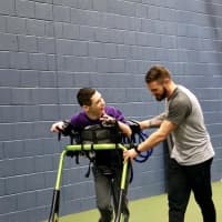 <p>Russ Van Ness, right, working with a client at Gifted Fitness in Ramsey.</p>