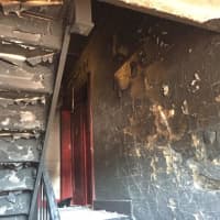 <p>Yonkers firefighters rescued at least seven residents who were trapped on the floor above an apartment building fire early Wednesday.</p>