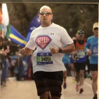 <p>Lanzilotti runs during the 2016 New York City Marathon when his headphones died  moments in.</p>