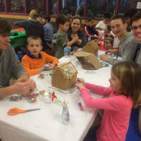 <p>Members of the Bronxville High School Habitat for Humanity Club helped elementary school students build gingerbread houses during the fourth annual Gingerbread House Making fundraiser.</p>