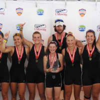 <p>Saugatuck Rowing Club’s womens youth 8+ crew and coaches celebrate after three-peating at the USRowing Youth National Championships. See story for IDs.</p>