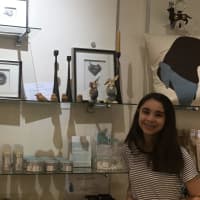 <p>New Canaan resident Nicole Ayoub, founder of Truly You Organics, with some of her products.</p>