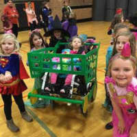 <p>Larchmont resident Olivia Vander Woude  with Troop 2997 at a Halloween dance.</p>