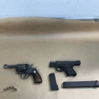 <p>Guns that were seized during the arrests.</p>