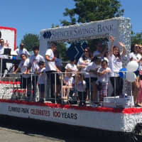 <p>Spencer Savings Bank was one of the float entries</p>