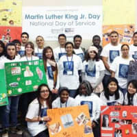 <p>A group of volunteers celebrating after volunteering during last year’s Martin Luther King Jr. National Day of Service.</p>