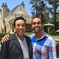 <p>Jesse Nager, left, and Smokey Robinson at the home of Barry Gordy Jr. in Beverly Hills.</p>