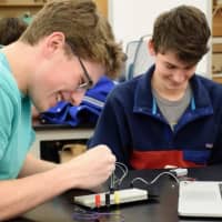 <p>With their newly acquired knowledge, the students began building their circuits on real breadboards.</p>
