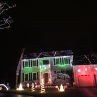 <p>The Schunk family in Ardsley decorates their house each year.</p>