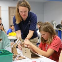 <p>Students work on a STEM project at the Maritime Aquarium as part of the Mayor’s Student Engineering &amp; Science Program.</p>