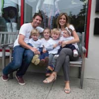 <p>Owners Carolyn and Dave Frost with their four children at the new Balance Yoga &amp; Wellness in Larchmont.</p>