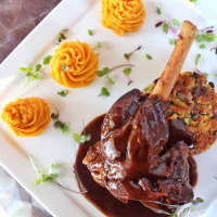 <p>TerraSole gets into the flavors of the season with this entree: Braised Colorado grass fed lamb shank with a lamb glaze served over multi-color cauliflower cake with pumpkin mashed potatoes.</p>