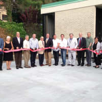 <p>Eastchester town and library officials unveiling the brand new reading courtyard.</p>