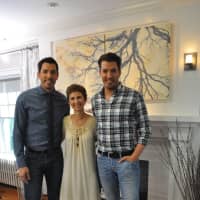 <p>Larchmont resident Kim Mitchell, center, with the Property Brothers Drew Scott, to her left, and Jonathan Scott on right.</p>