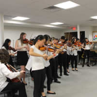 <p>Members of the Scarsdale Middle School band performed for clients at the Open Arms Men&#x27;s Shelter in White Plains.</p>