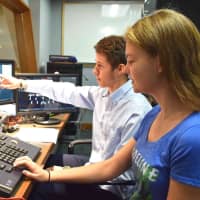<p>Bronxville High School sophomore Maddie Hanley and senior Liam Siegel operate the state-of-the-art lighting and sound booth in the district’s auditorium.</p>